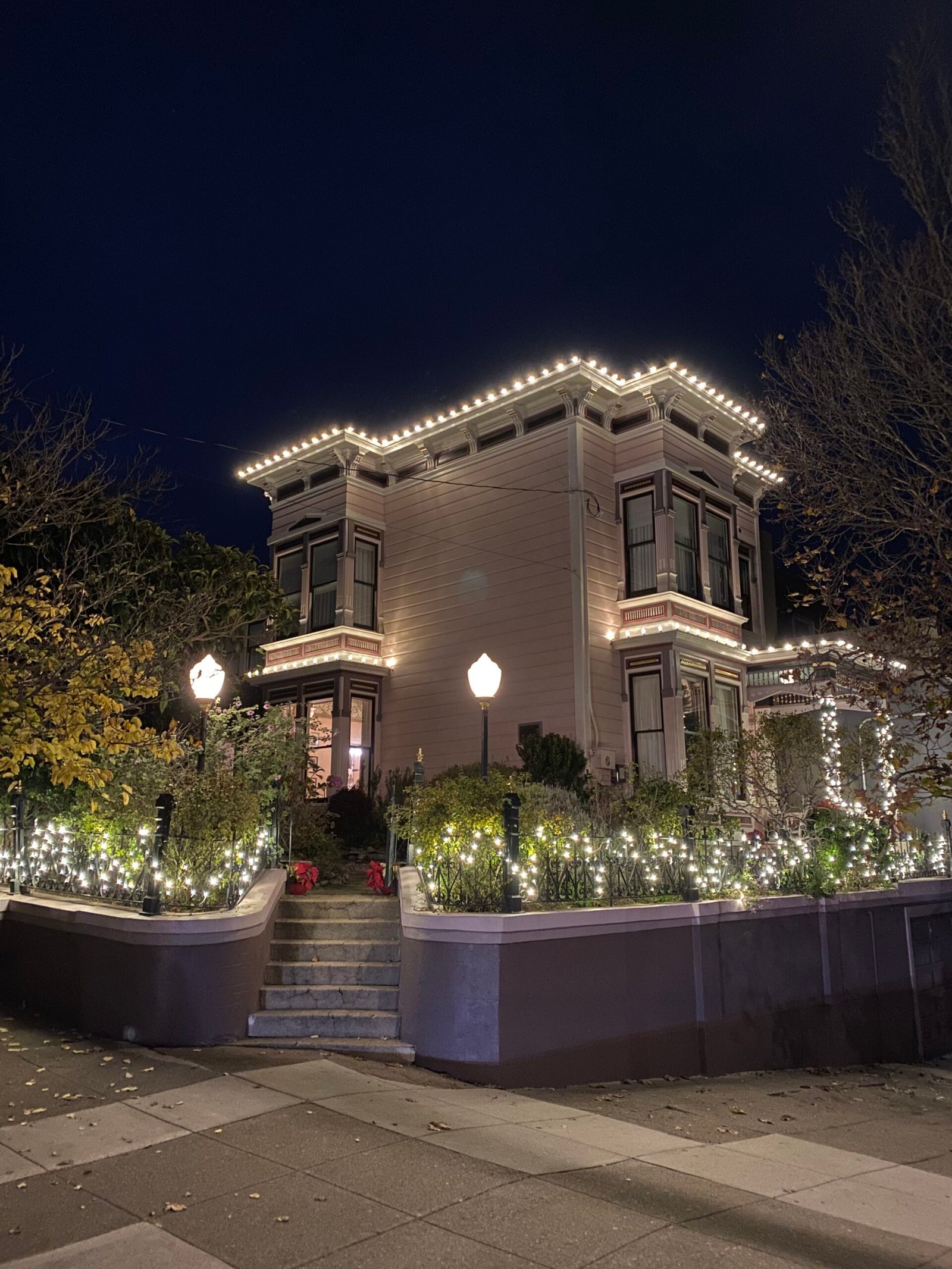 Custom architectural holiday lighting on a San Francisco home