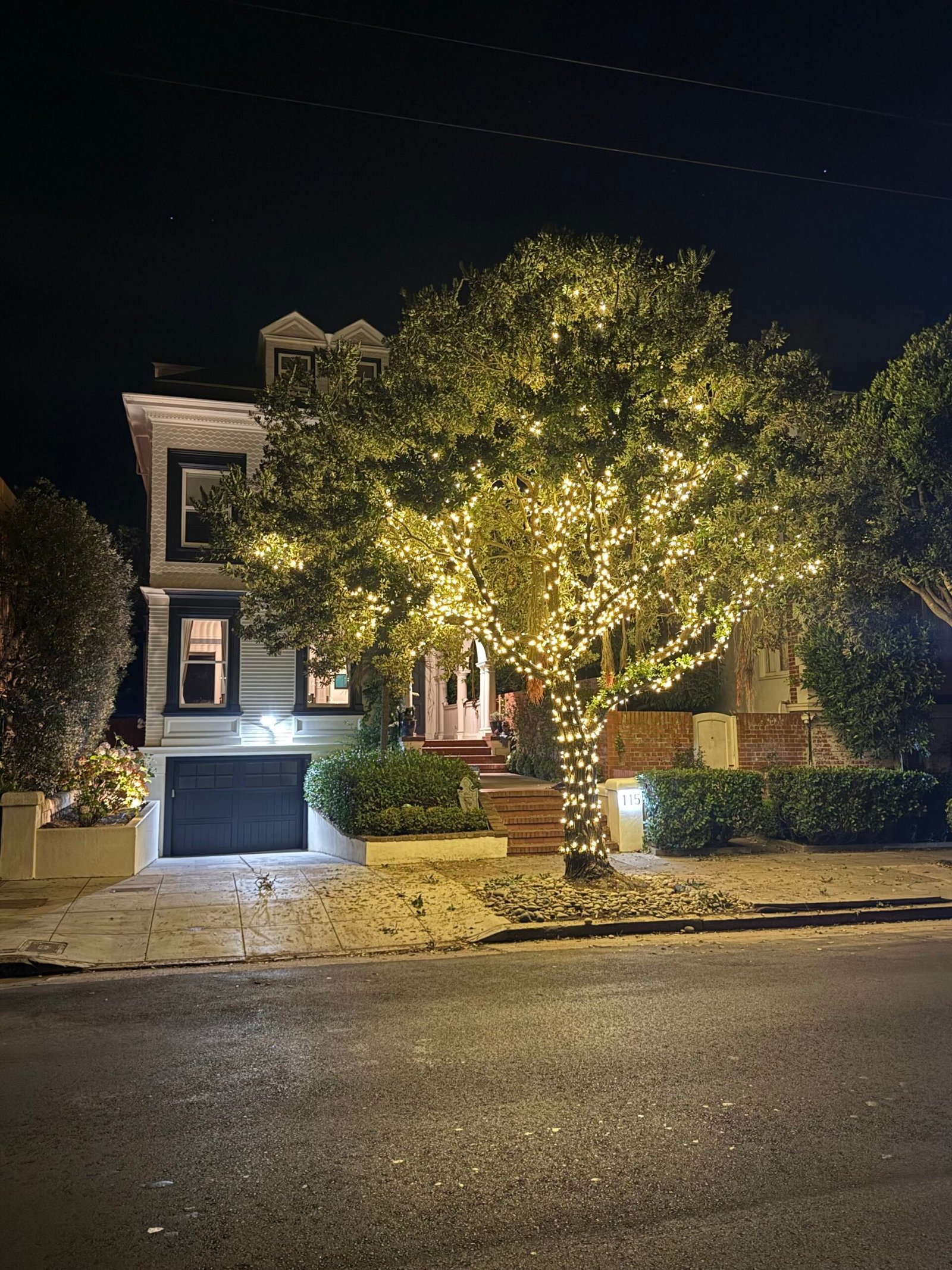 Large professionally wrapped Christmas tree installation
